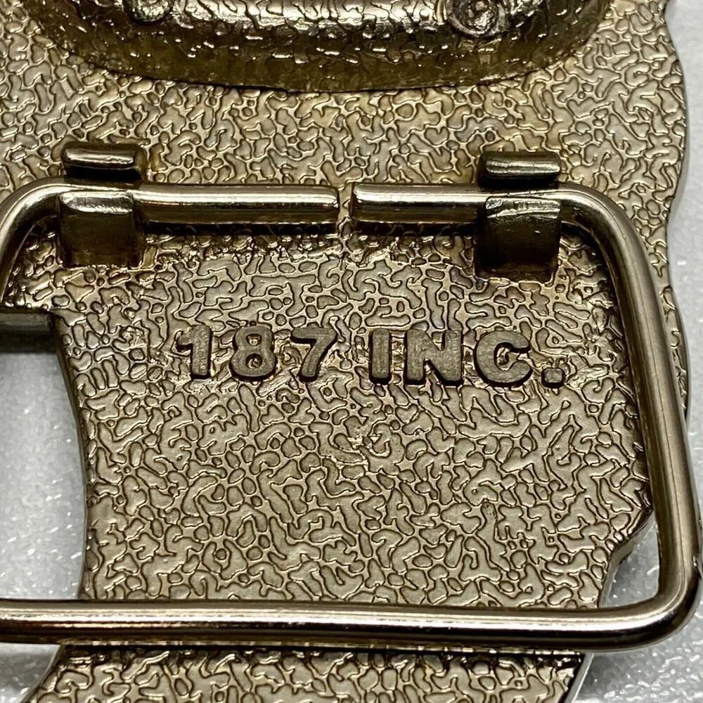 Cadillac 187 INC. Belt Buckle Bottle Opener Tool 5” Chrome Black Winged Logo Vtg